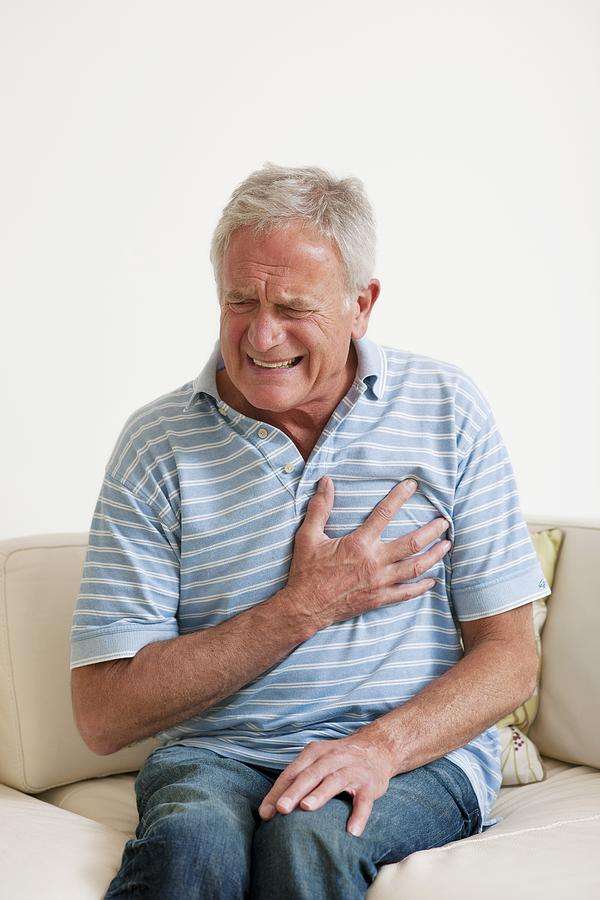 Man Having A Heart Attack Photograph by